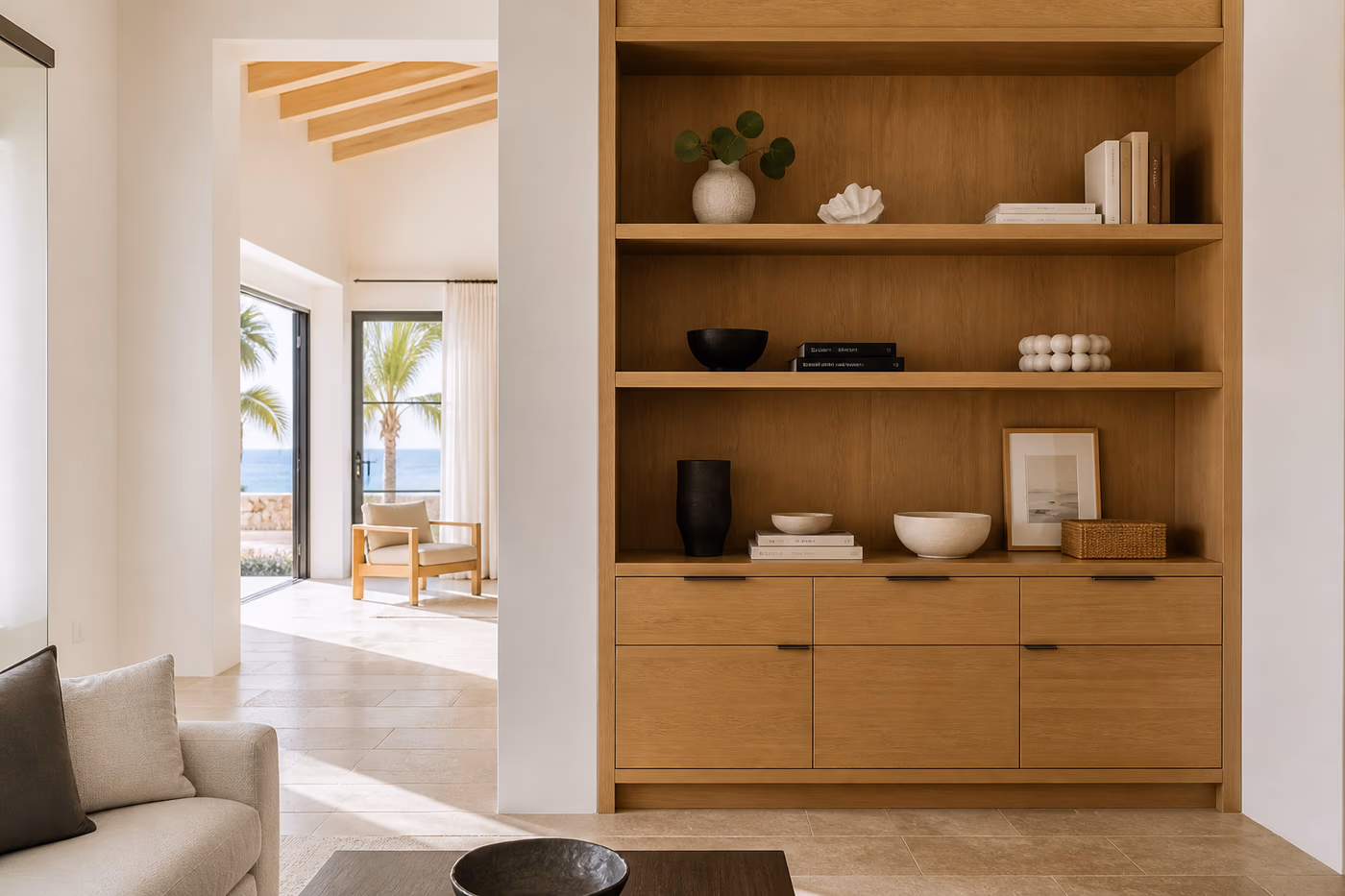 Warm oak custom cabinetry in a bright Bermuda-style interior